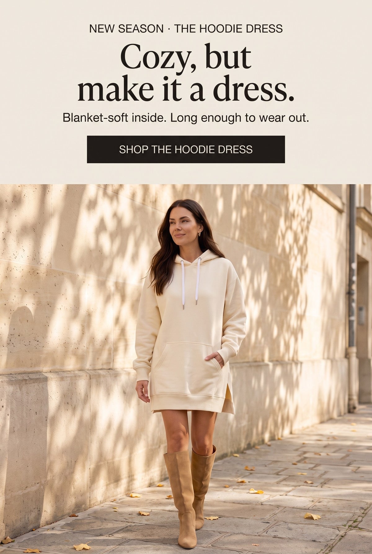 Woman in the cream Junemae oversized hoodie dress. Cozy, but make it a dress.