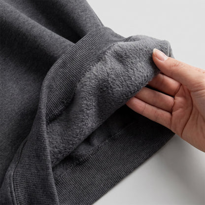Close-up of the blanket-soft brushed fleece lining inside the Junemae hoodie dress
